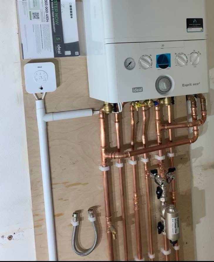 MDR boiler installation with neatly arranged copper pipework
